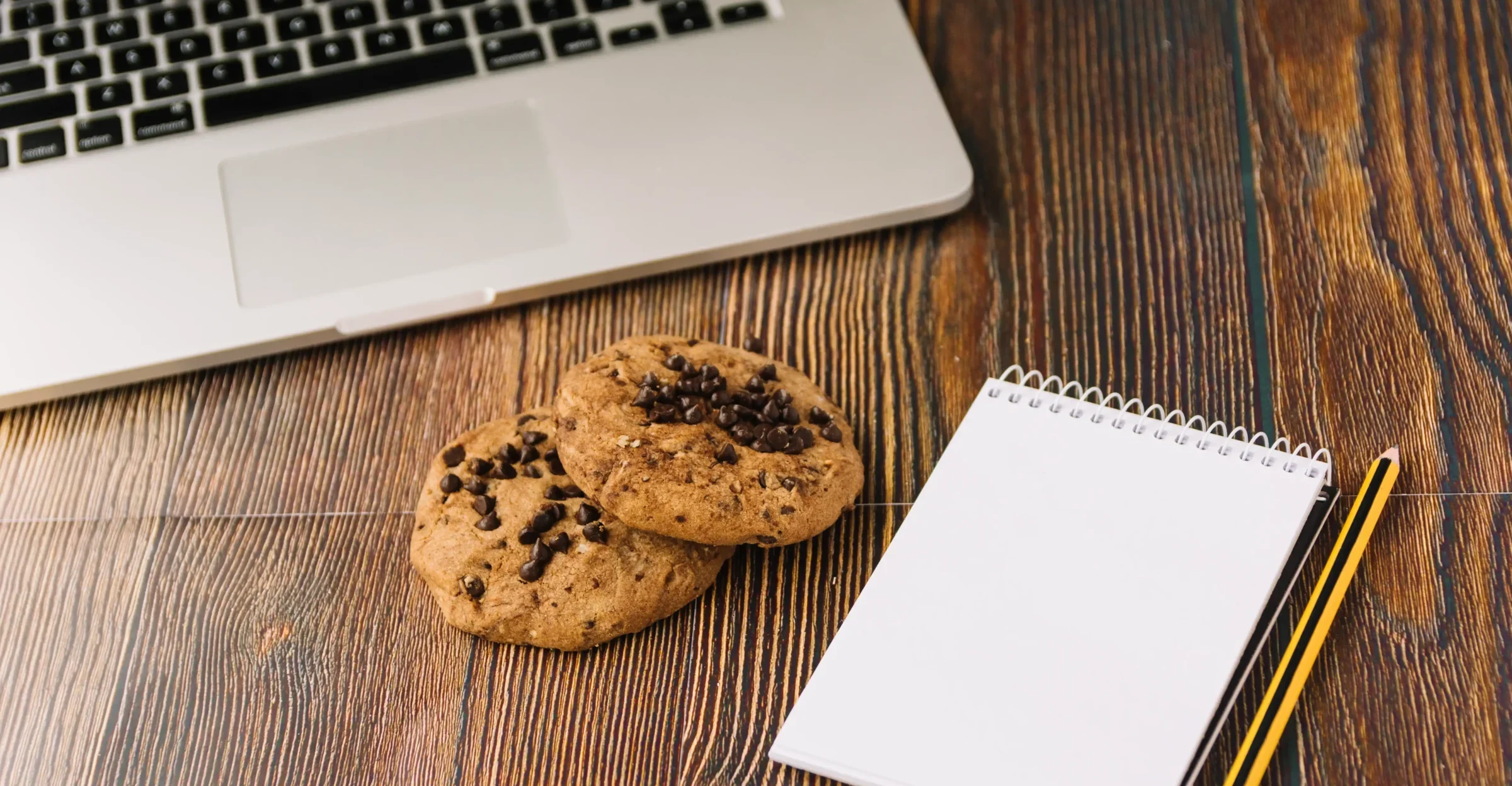 biscuits-near-notebook-laptop